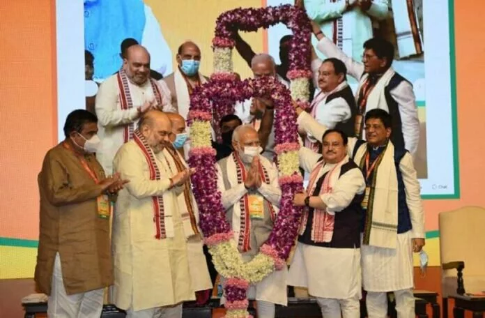 BJP National Executive Meeting: 100 करोड़ टीकाकरण के लिए पीएम मोदी को किया गया सम्मान, नड्डा बोले- बंगाल में नया इतिहास रचेगी भाजपा